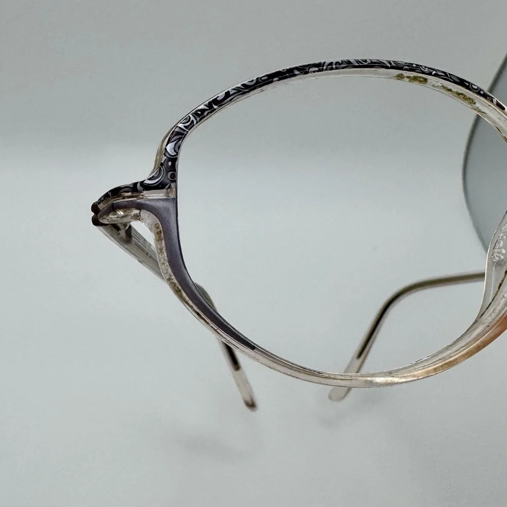 Silhouette SPX M1911 55-14-135 Black and Tan Oval Glasses
